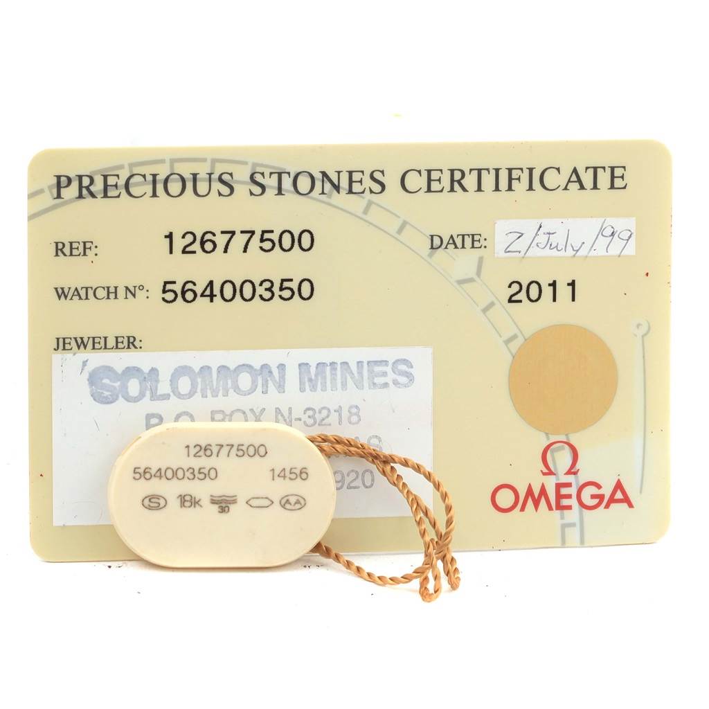 The image shows the certification card and tag for the Omega 1267.75.00 Women's Steel and Gold (two tone) Mother of Pearl Dial 1267.75.00 Women's Steel and Gold (two tone) Mother of Pearl Dial Constellation Mini MOP Diamond Ladies Watch 1267.75.00.