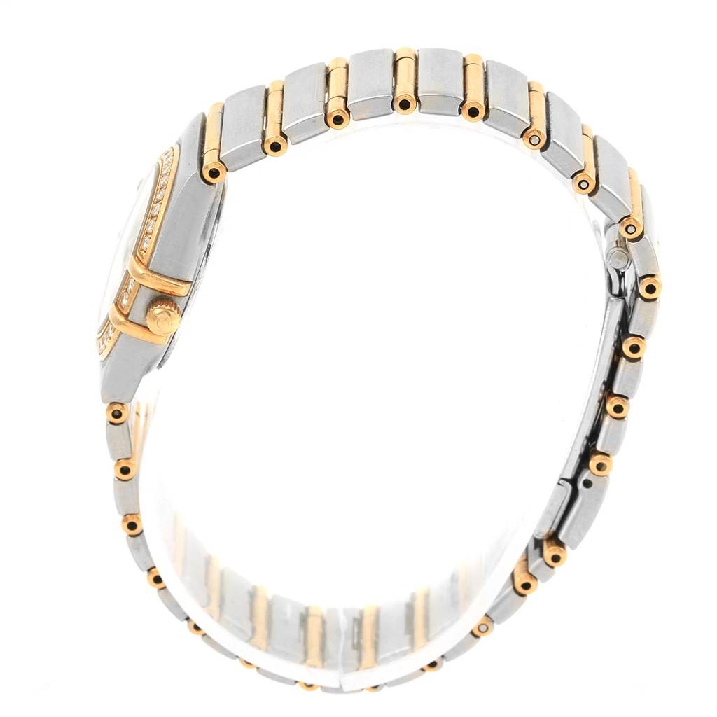 The image shows a side view of the Omega 1267.75.00 Women's Steel and Gold (two tone) Mother of Pearl Dial 1267.75.00 Women's Steel and Gold (two tone) Mother of Pearl Dial Constellation Mini MOP Diamond Ladies Watch 1267.75.00, focused on its band and crown.
