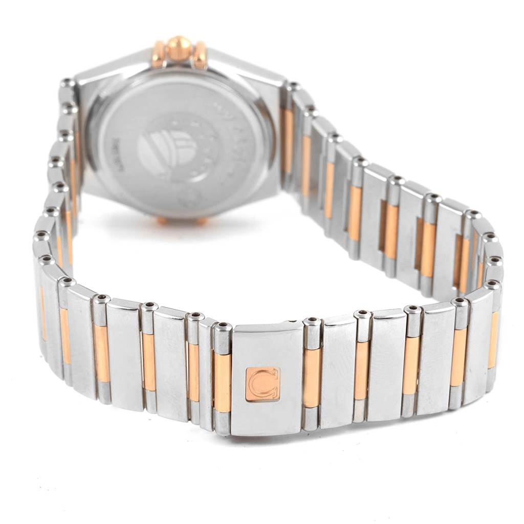 The Omega 1465.79.00 Women's Steel and Gold (two tone) Mother of Pearl Dial 1465.79.00 Women's Steel and Gold (two tone) Mother of Pearl Dial Constellation Iris My Choice Steel Rose Gold Ladies Watch 1373.79 is shown from the back, highlighting its band and clasp.
