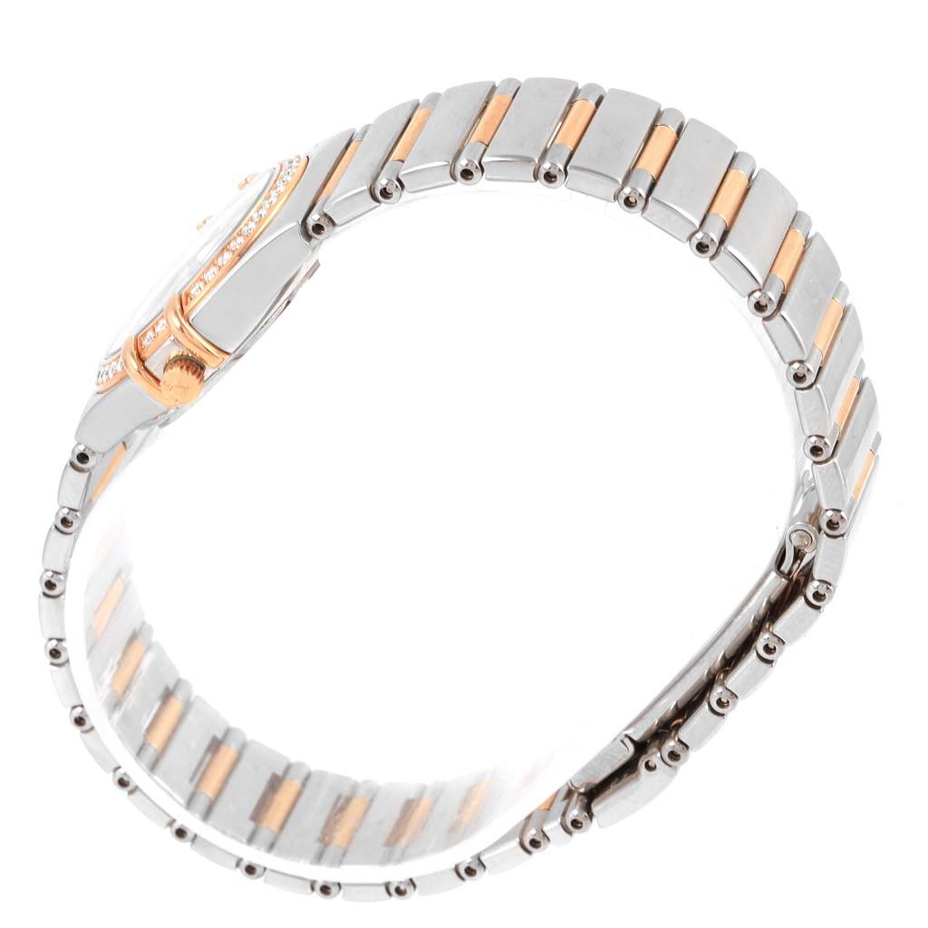 This image features a side view of the bracelet and case of the Omega 1465.79.00 Women's Steel and Gold (two tone) Mother of Pearl Dial 1465.79.00 Women's Steel and Gold (two tone) Mother of Pearl Dial Constellation Iris My Choice Steel Rose Gold Ladies Watch 1373.79.