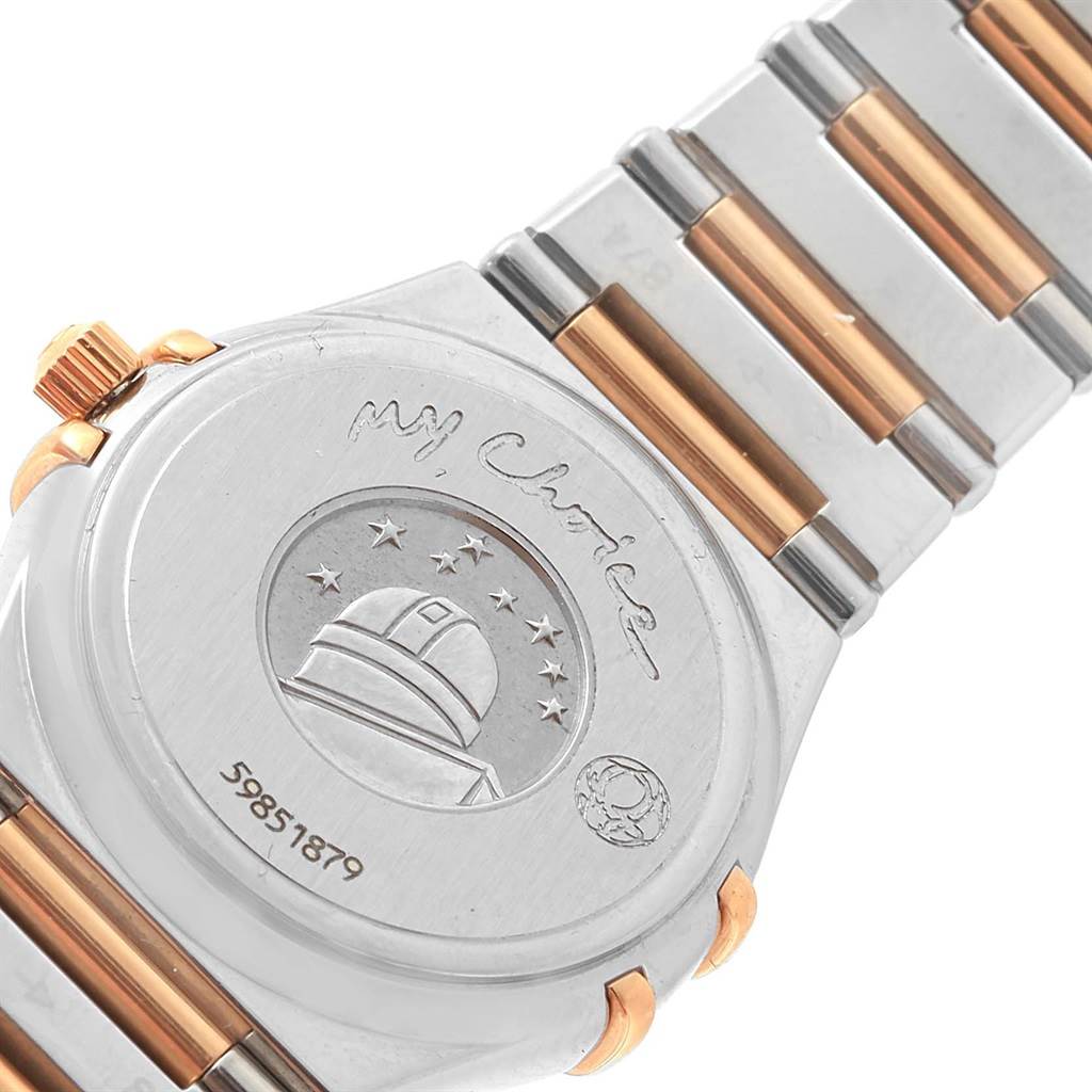 The image shows the back case and part of the bracelet of the Omega 1465.79.00 Women's Steel and Gold (two tone) Mother of Pearl Dial 1465.79.00 Women's Steel and Gold (two tone) Mother of Pearl Dial Constellation Iris My Choice Steel Rose Gold Ladies Watch, model 1373.79.