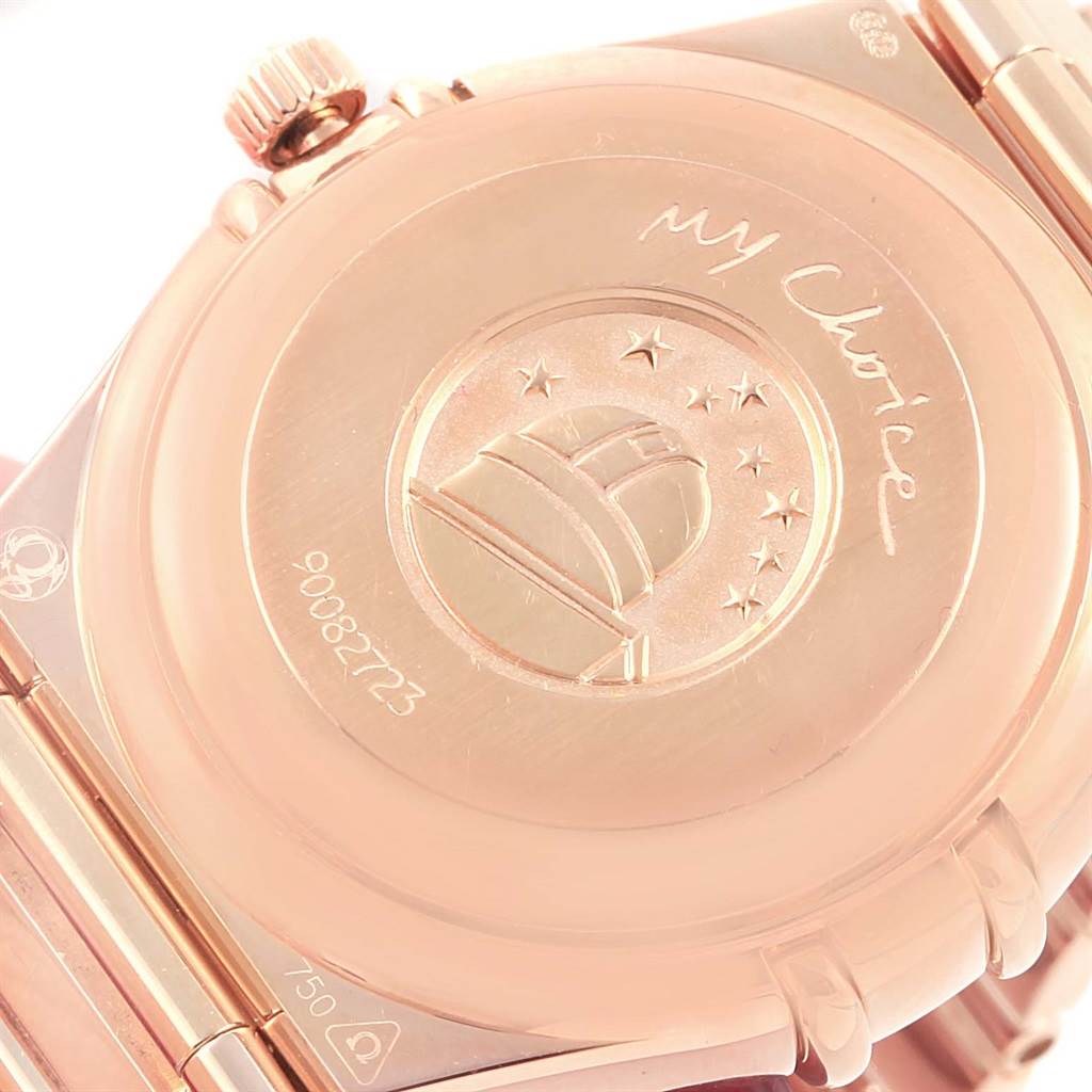 The image shows the back view of the Omega 1140.79.00 Women's Rose Gold Mother of Pearl Dial 1140.79.00 Women's Rose Gold Mother of Pearl Dial Constellation Iris My Choice Rose Gold Ladies Watch 1140.79, highlighting the case back and crown.