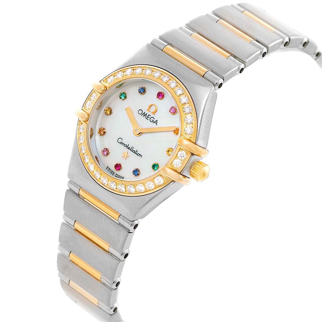 This Omega 1365.79.00 Women's Steel and Gold (two tone) Mother of Pearl Dial 1365.79.00 Women's Steel and Gold (two tone) Mother of Pearl Dial Constellation Iris Steel Yellow Gold Multi Stone Watch 1365.79.00 is shown at an angled view highlighting its face and bracelet.