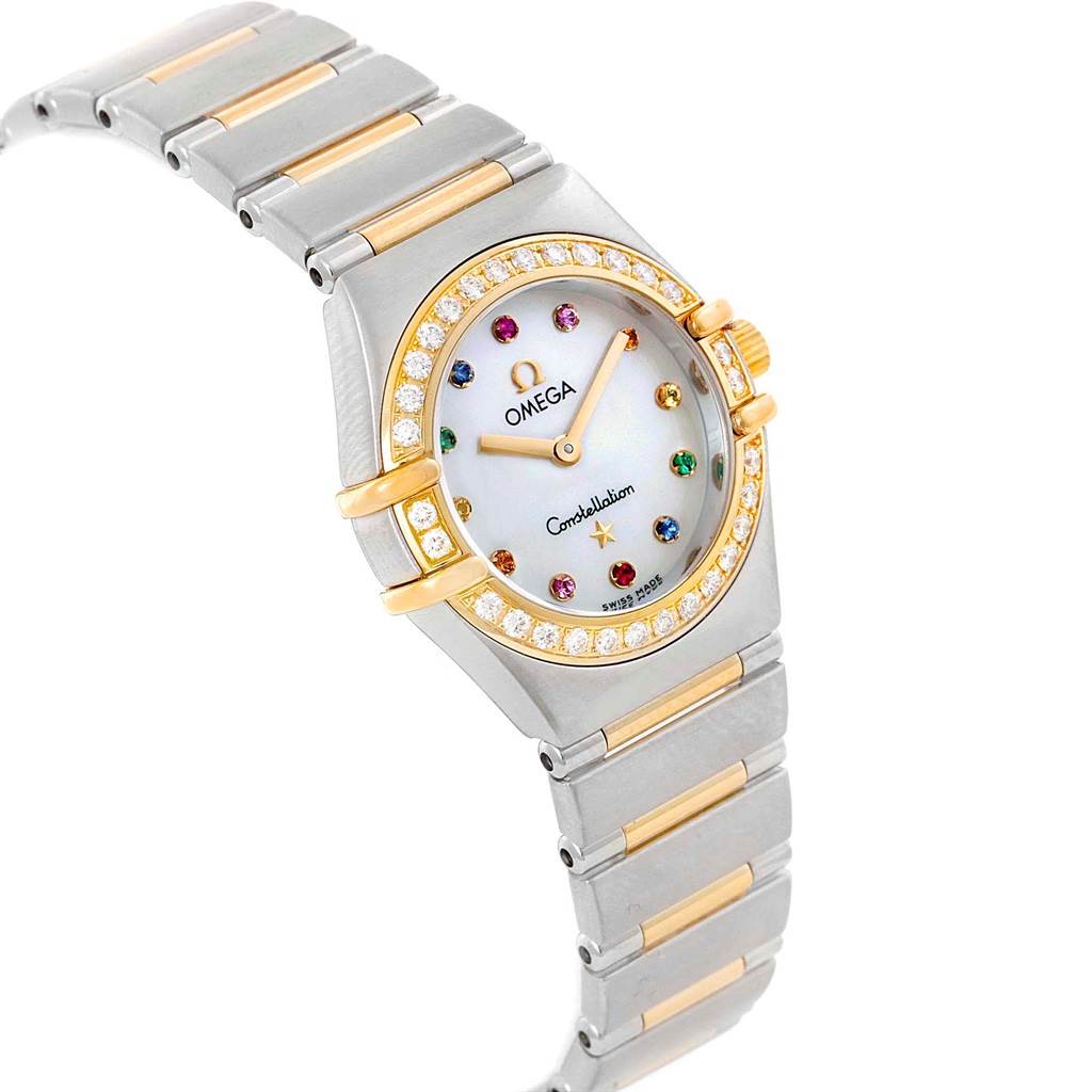 The image shows an angled view of the Omega 1365.79.00 Women's Steel and Gold (two tone) Mother of Pearl Dial 1365.79.00 Women's Steel and Gold (two tone) Mother of Pearl Dial Constellation Iris Steel Yellow Gold Multi Stone Watch 1365.79.00, highlighting its face, bezel, and bracelet.