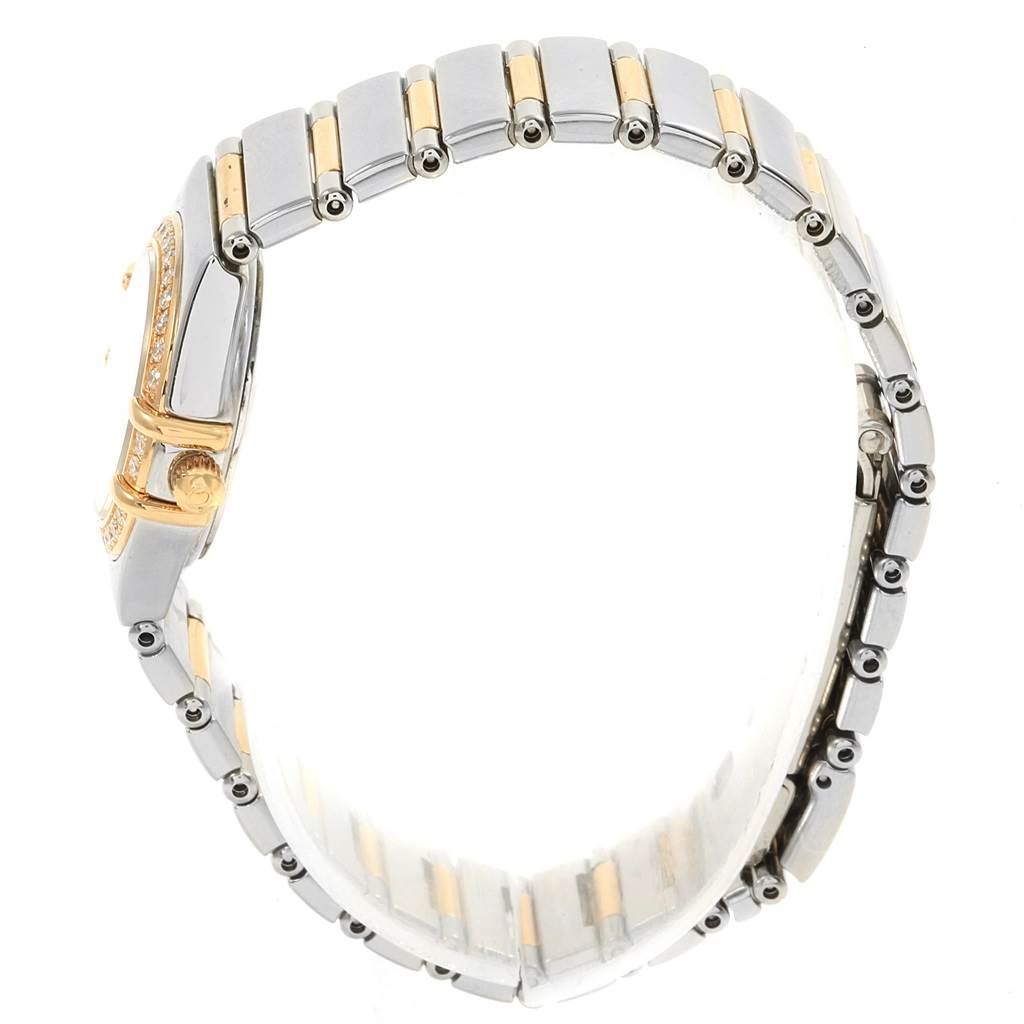 The image shows a side view of an Omega 1365.79.00 Women's Steel and Gold (two tone) Mother of Pearl Dial 1365.79.00 Women's Steel and Gold (two tone) Mother of Pearl Dial Constellation Iris Steel Yellow Gold Multi Stone Watch 1365.79.00, highlighting the band and crown.