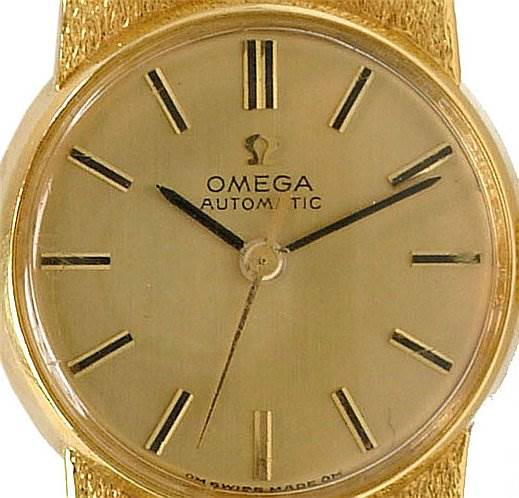 The image shows a frontal view of the Vintage Ladies 18k Yellow Gold 7169 watch by Omega 7169 Women's Yellow Gold Champagne Dial 7169 Women's Yellow Gold Champagne Dial, highlighting the dial and hands.