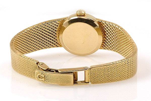 The image shows the back view and clasp of the Omega 7169 Women's Yellow Gold Champagne Dial 7169 Women's Yellow Gold Champagne Dial Vintage Ladies 18k Yellow Gold 7169 Watch.