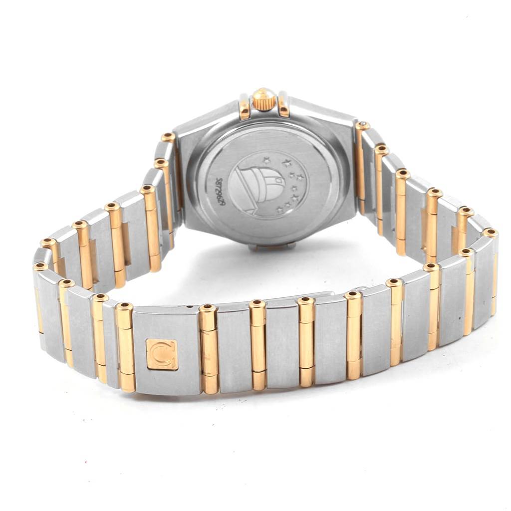 The image shows the back view of the Omega 1267.75.00 Women's Steel and Gold (two tone) Mother of Pearl Dial 1267.75.00 Women's Steel and Gold (two tone) Mother of Pearl Dial Constellation Mini Mother of Pearl Diamond Watch 1267.75.00, highlighting its bracelet and case back.