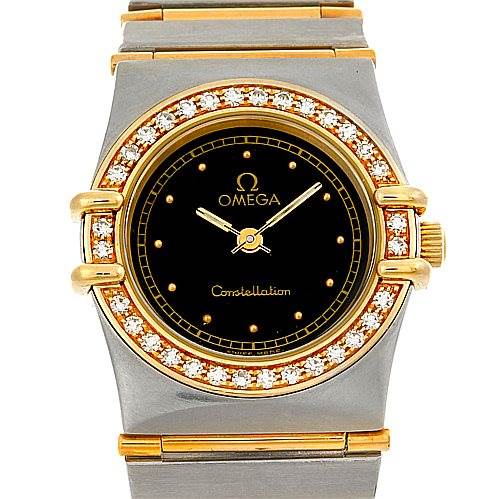 The image shows a front view of the Omega 1267.10.00 Women's Steel and Gold (two tone) Black Dial 1267.10.00 Women's Steel and Gold (two tone) Black Dial Constellation Diamond Mini 1267.10.00 watch, highlighting its diamond-studded bezel and black dial.