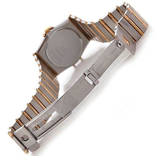 The image displays the back and clasp of the Omega 1267.10.00 Women's Steel and Gold (two tone) Black Dial 1267.10.00 Women's Steel and Gold (two tone) Black Dial Constellation Diamond Mini 1267.10.00 watch, showcasing its stainless steel and gold bracelet.