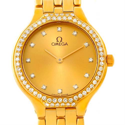 The image shows a front view of the Omega Women's Yellow Gold Champagne Dial Women's Yellow Gold Champagne Dial DeVille Ladies 18K Yellow Gold Diamond Watch, highlighting its dial, bezel, bracelet, and crown.