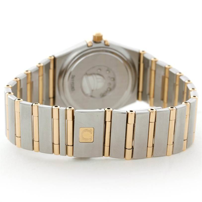 The image shows the back and bracelet of an Omega 1277.70.00 Women's Steel and Gold (two tone) Mother of Pearl Dial 1277.70.00 Women's Steel and Gold (two tone) Mother of Pearl Dial Constellation My Choice Steel Gold Diamond Watch 1277.70.00 model. 