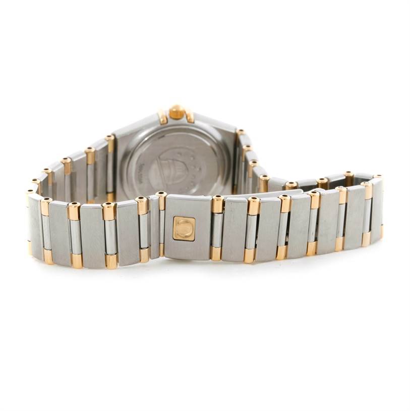 The image shows the back and bracelet of the Omega 56945066 Women's Steel and Gold (two tone) Mother of Pearl Dial 56945066 Women's Steel and Gold (two tone) Mother of Pearl Dial Constellation Mini Steel and Gold Diamond Watch.