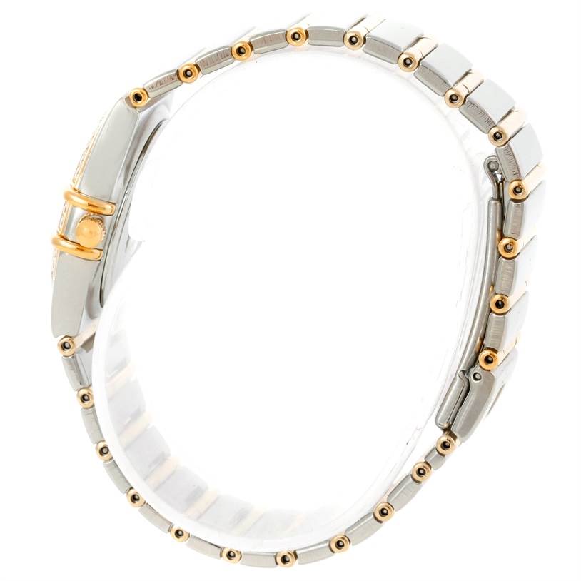 The image shows a side profile of the Omega 1277.70.00 Women's Steel and Gold (two tone) Mother of Pearl Dial 1277.70.00 Women's Steel and Gold (two tone) Mother of Pearl Dial Constellation My Choice Steel Gold Diamond Watch 1277.70.00, highlighting its band and clasp.