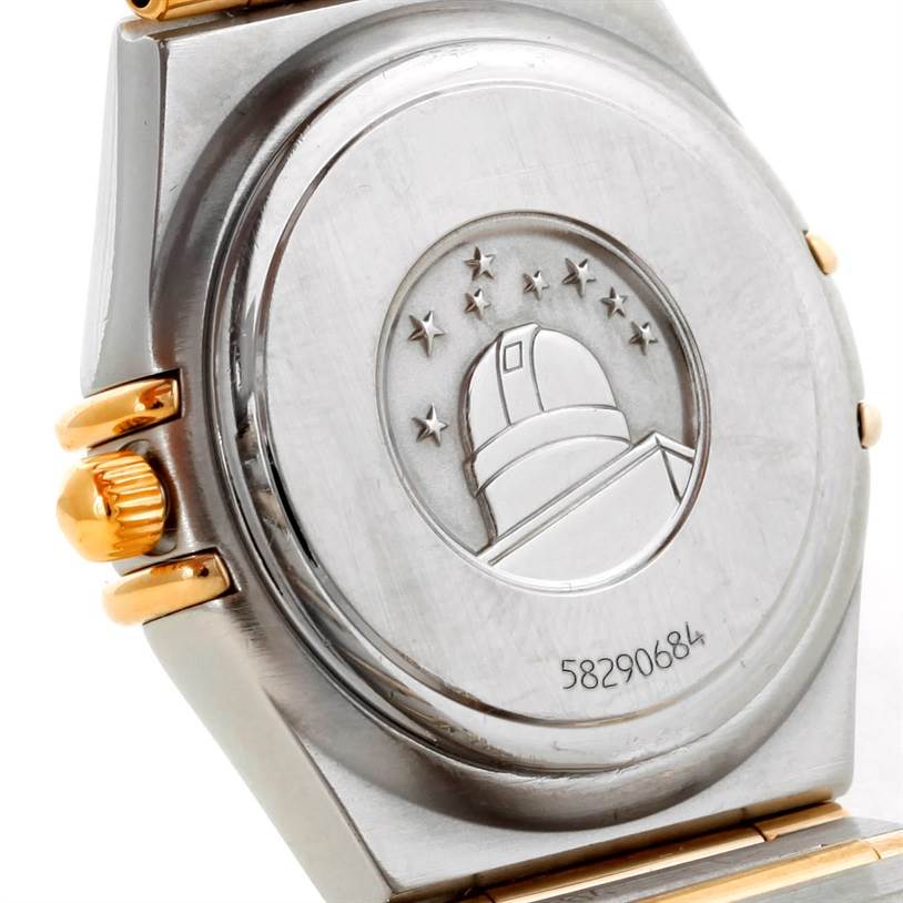 The image shows the back case and crown of the Omega 1277.70.00 Women's Steel and Gold (two tone) Mother of Pearl Dial 1277.70.00 Women's Steel and Gold (two tone) Mother of Pearl Dial Constellation My Choice Steel Gold Diamond Watch 1277.70.00 model.