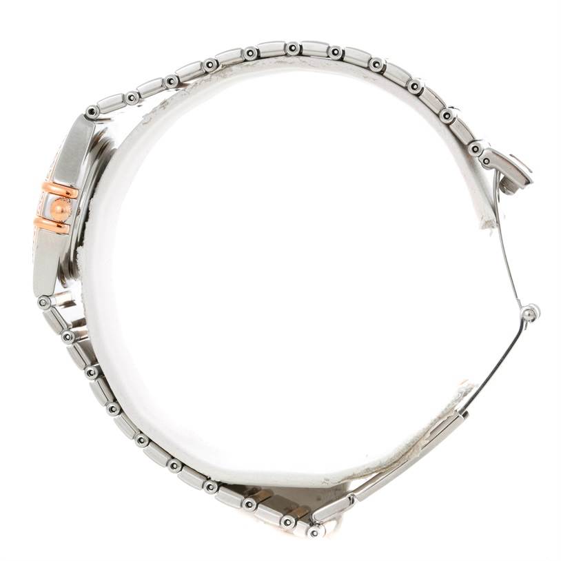 This side-profile view of the Omega 1358.79.00 Women's Steel and Gold (two tone) Mother of Pearl Dial 1358.79.00 Women's Steel and Gold (two tone) Mother of Pearl Dial Constellation Iris Steel Rose Gold Multi Stone Watch 1358.79.00 showcases its bracelet and clasp.