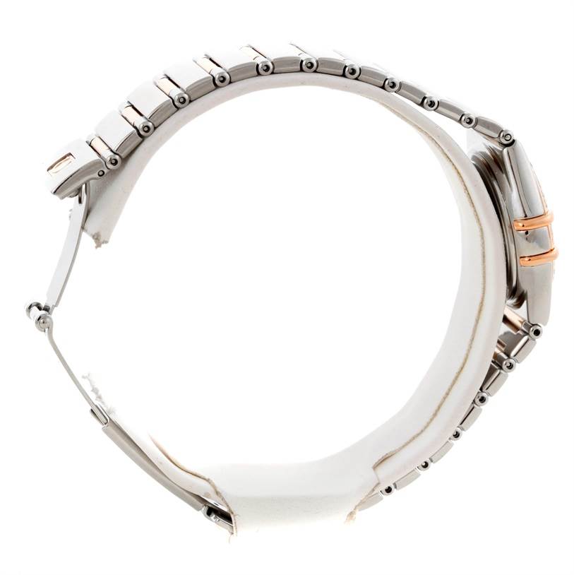 The image shows a side angle of the Omega 1358.79.00 Women's Steel and Gold (two tone) Mother of Pearl Dial 1358.79.00 Women's Steel and Gold (two tone) Mother of Pearl Dial Constellation Iris Steel Rose Gold Multi Stone Watch 1358.79.00, highlighting its strap and clasp.