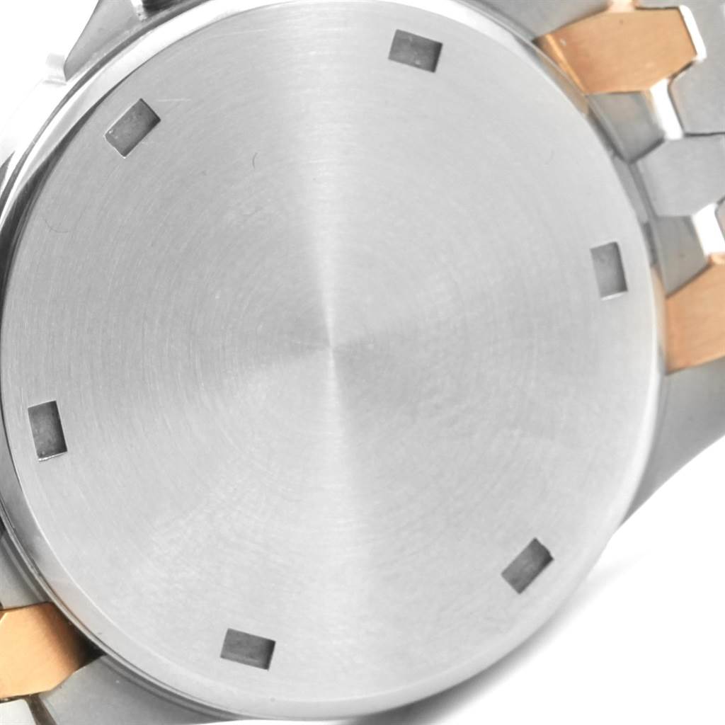 This image shows the stainless steel case back of a Patek Philippe Neptune 5080/I JA Men's Steel and Gold (two tone) Black Dial 5080/I JA Men's Steel and Gold (two tone) Black Dial model watch, with parts of the bracelet visible.