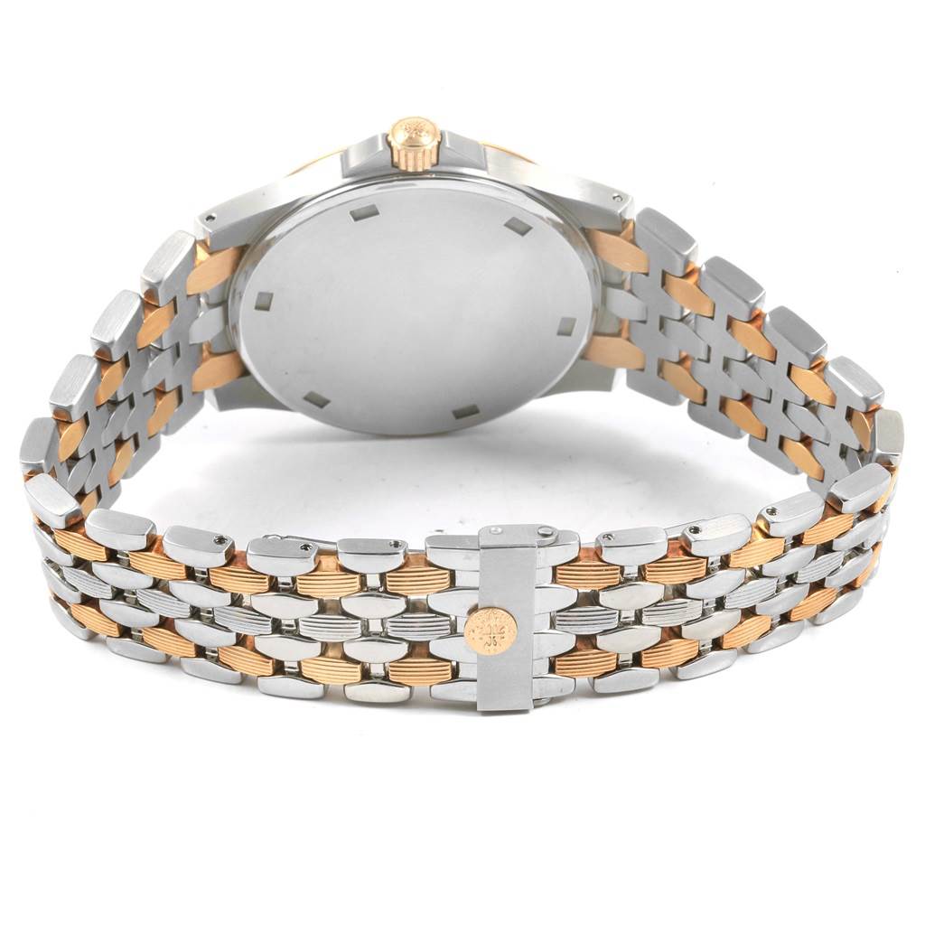 This image shows the backside and strap of the Neptune model by Patek Philippe, highlighting its two-tone metal bracelet and case back.