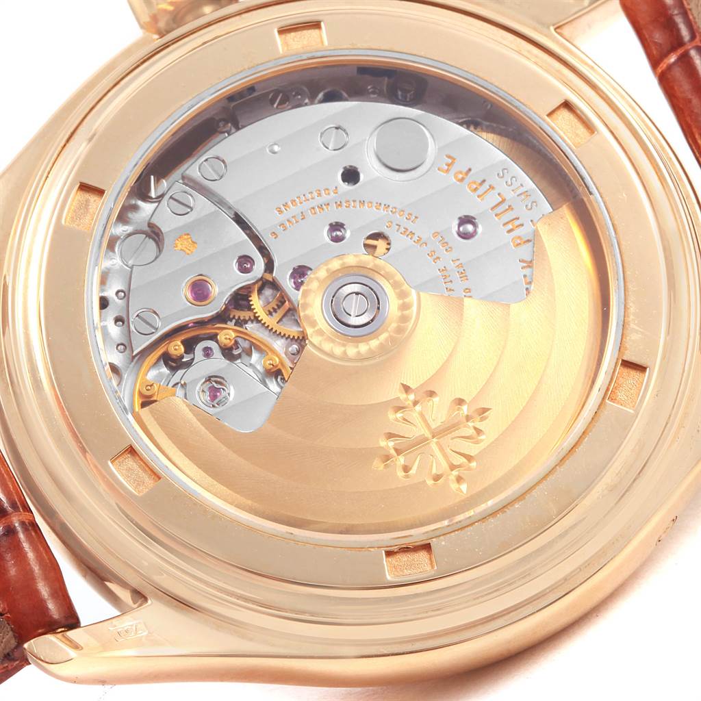 This image shows the back of the Patek Philippe 5035J Men's Yellow Gold Silver Dial 5035J Men's Yellow Gold Silver Dial Complicated Annual Calendar Yellow Gold Mens Watch 5035, highlighting its movement.