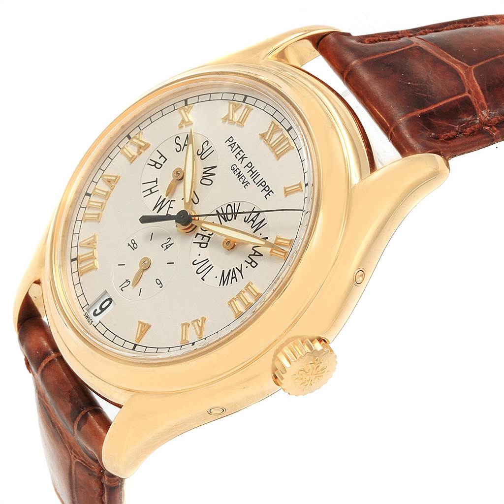The image shows a side view of the Patek Philippe 5035J Men's Yellow Gold Silver Dial 5035J Men's Yellow Gold Silver Dial Complicated Annual Calendar Yellow Gold Men's Watch 5035, highlighting the dial and strap.