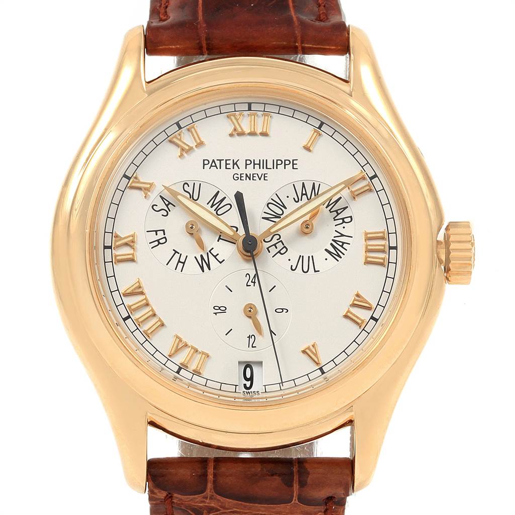 The image shows a frontal view of the Patek Philippe 5035J Men's Yellow Gold Silver Dial 5035J Men's Yellow Gold Silver Dial Complicated Annual Calendar Yellow Gold Men's Watch 5035, highlighting the dial and calendar features.