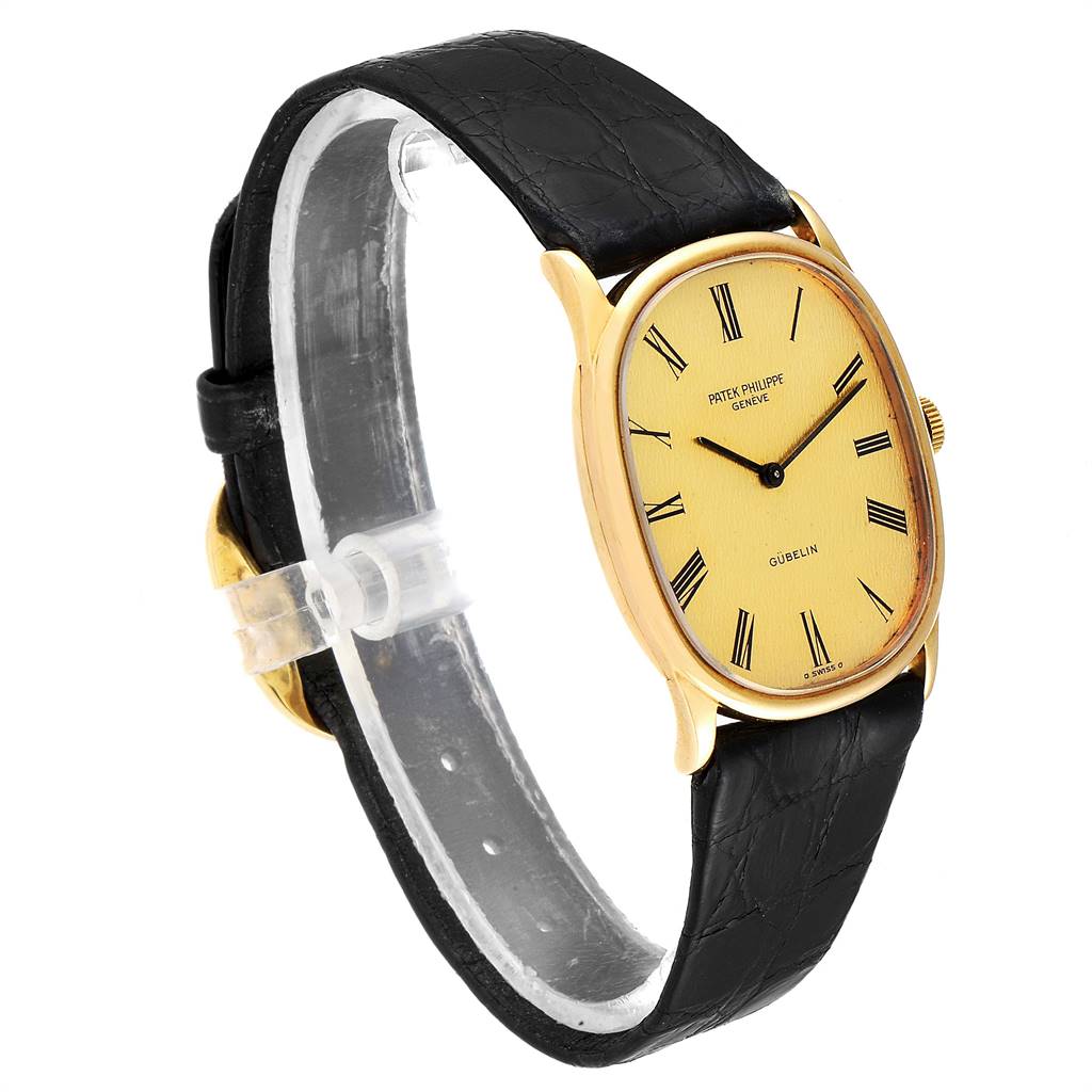 The image shows a Patek Philippe Golden Ellipse 3846 Men's Yellow Gold Champagne Dial 3846 Men's Yellow Gold Champagne Dial watch at a three-quarter angle, highlighting the dial, case, and leather strap.