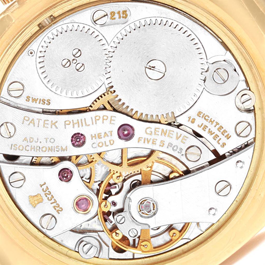 The image shows the movement mechanism of a Patek Philippe Golden Ellipse 3846 Men's Yellow Gold Champagne Dial 3846 Men's Yellow Gold Champagne Dial watch, including gears and jewels.