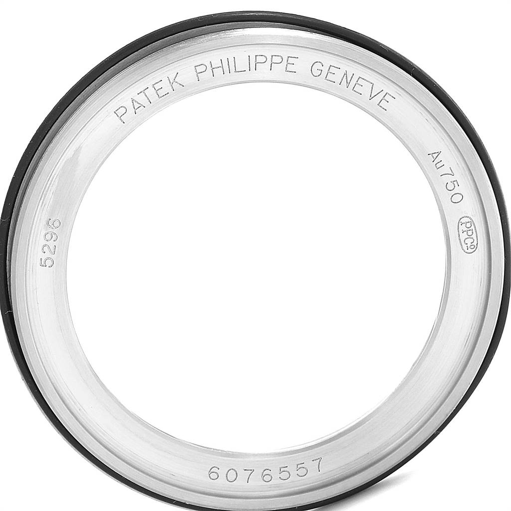 The image shows the bezel of a Patek Philippe Calatrava 5296G Men's White Gold Silver Dial 5296G Men's White Gold Silver Dial model watch, marked with inscriptions and model specifics.