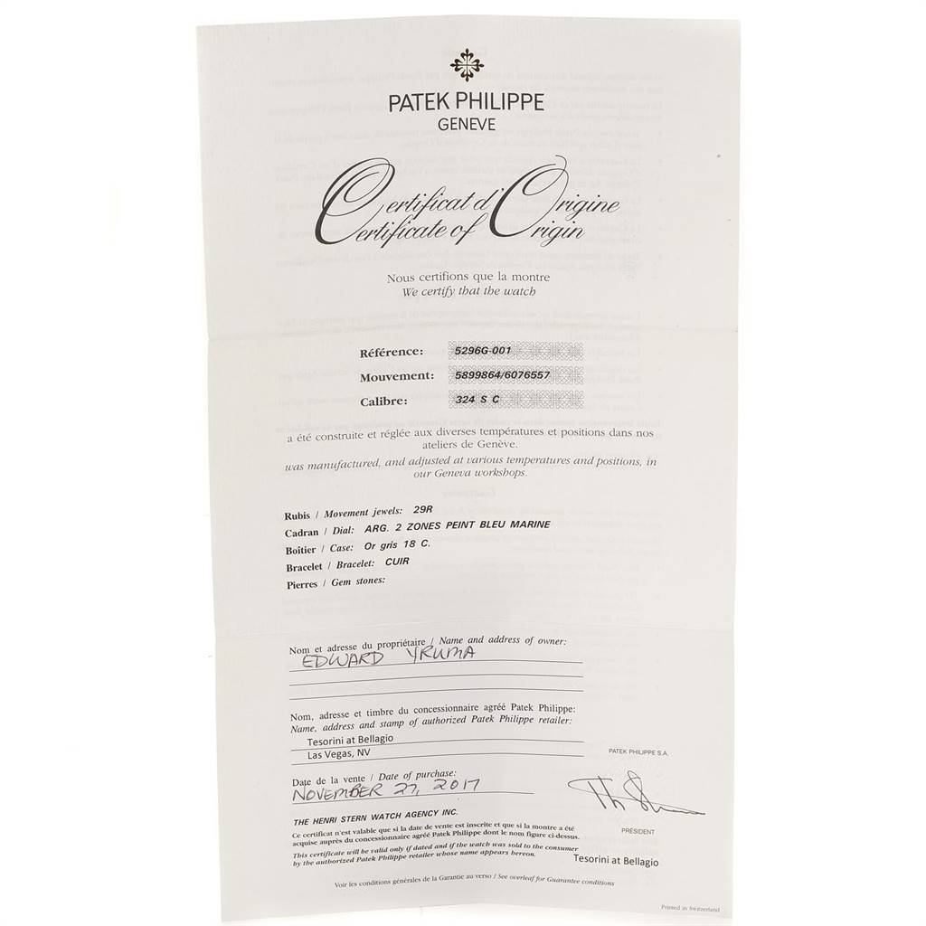 The image shows a certificate of origin for a Patek Philippe Calatrava 5296G Men's White Gold Silver Dial 5296G Men's White Gold Silver Dial model watch, photographed from the front.