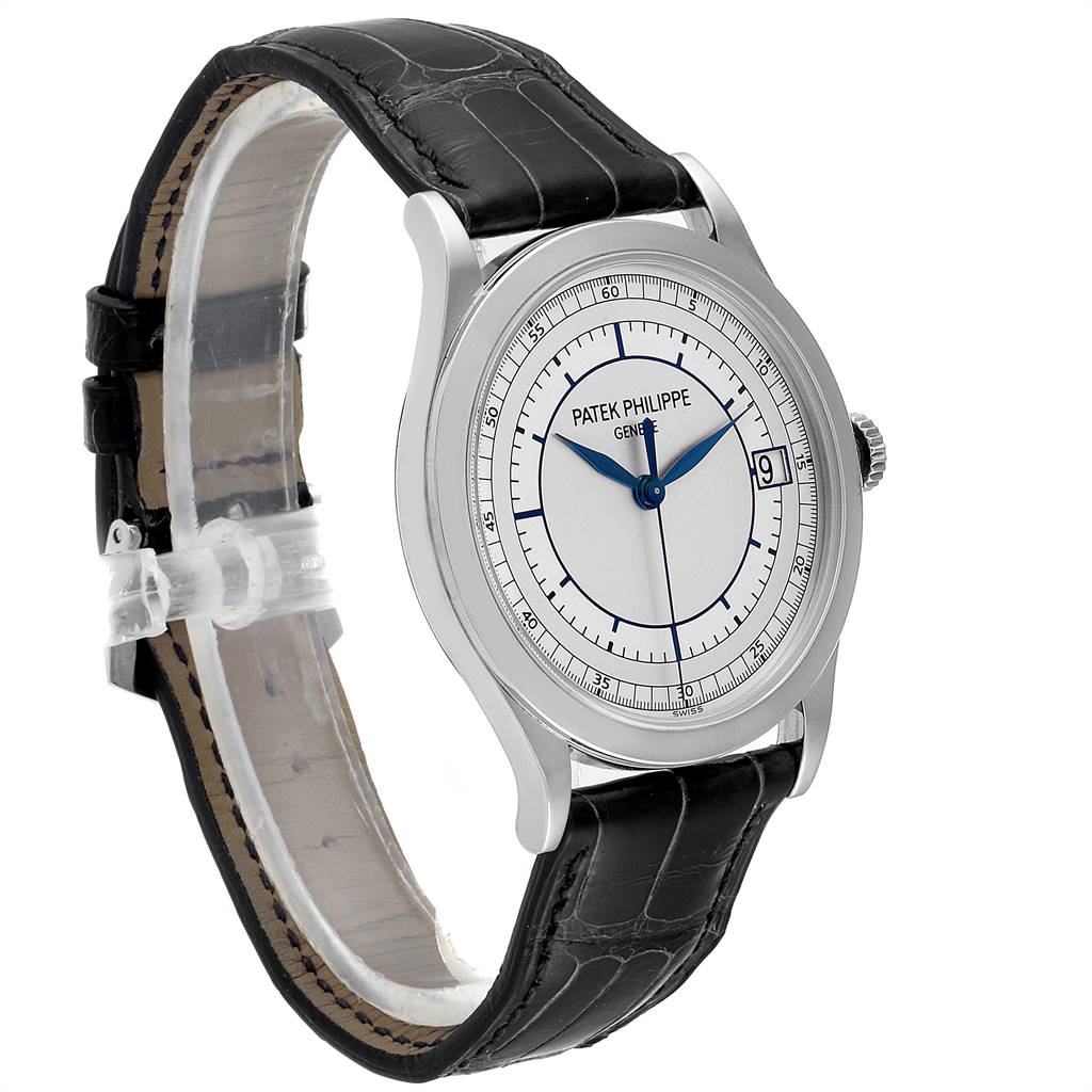 The image shows a side angle of a Patek Philippe Calatrava 5296G Men's White Gold Silver Dial 5296G Men's White Gold Silver Dial watch featuring the face, case, and black leather strap.
