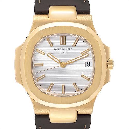 The image shows a front view of a Patek Philippe Nautilus 5711J Men's Yellow Gold Silver Dial 5711J Men's Yellow Gold Silver Dial watch, featuring its face, case, and part of the strap.