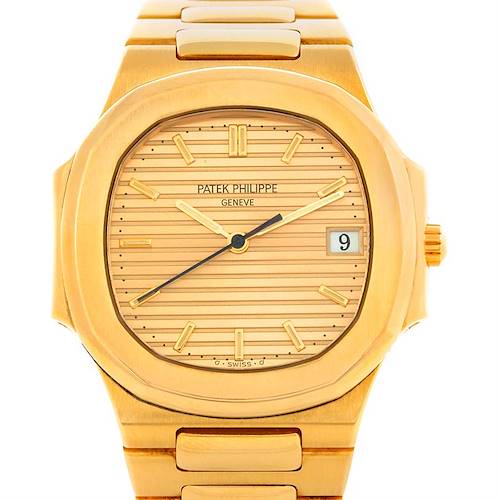 This image shows a front view of a Patek Philippe Nautilus 3900/1J Men's Yellow Gold Champagne Dial 3900/1J Men's Yellow Gold Champagne Dial watch, highlighting its dial, case, and part of the bracelet.