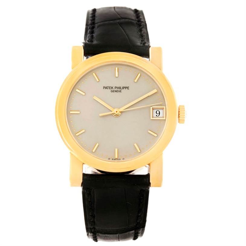 This image shows a front view of the Patek Philippe Calatrava 5012 Men's Yellow Gold Beige Dial 5012 Men's Yellow Gold Beige Dial watch, highlighting its face, hands, and strap.