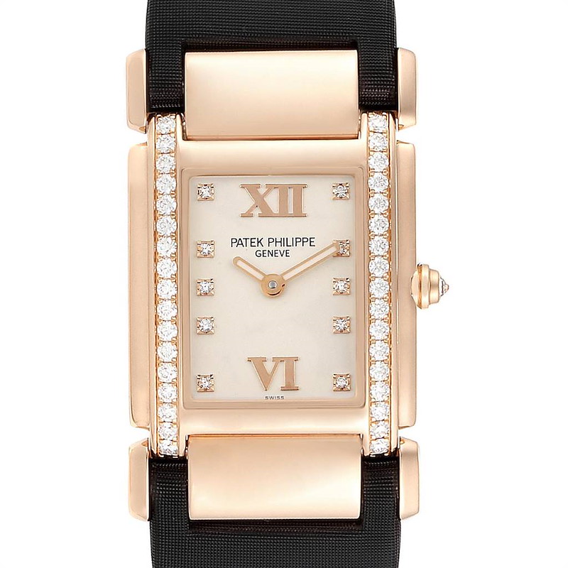 The image shows a front view of a Patek Philippe Twenty-4 4920R-10 Women's Rose Gold Silver Dial 4920R-10 Women's Rose Gold Silver Dial watch, highlighting its rectangular face and diamond accents.