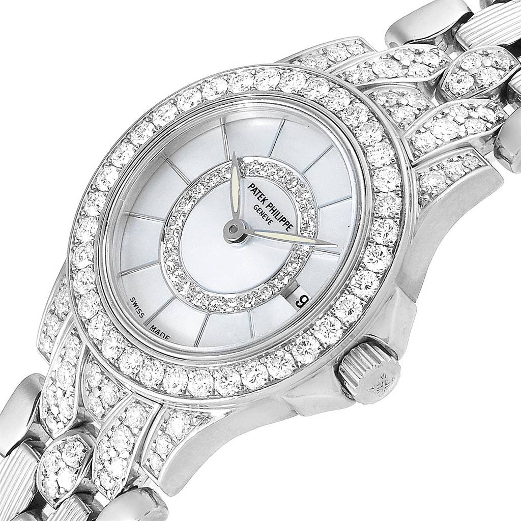 The image shows the face and bezel of the Patek Philippe Neptune 4881-120G Women's White Gold Mother of Pearl Dial 4881-120G Women's White Gold Mother of Pearl Dial model, adorned with diamonds, at a slight angle.