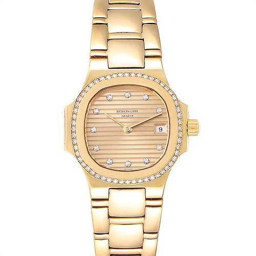 This image shows a front view of a Patek Philippe Nautilus 4700 Women's Yellow Gold Champagne Dial 4700 Women's Yellow Gold Champagne Dial watch with a gold bracelet and diamond-set bezel.