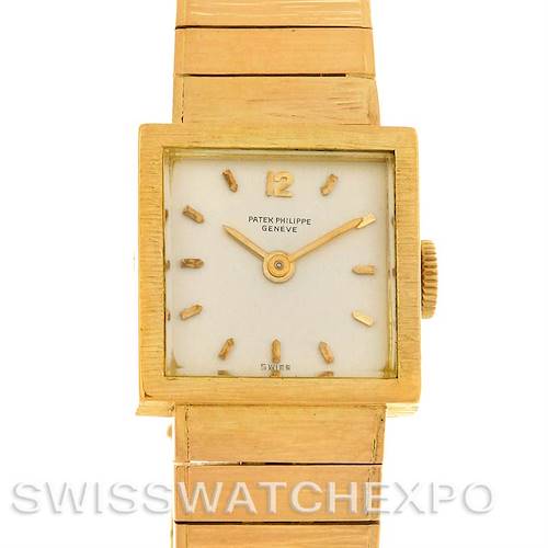 The image shows a front view of the Patek Philippe Vintage 3285/23 Women's Yellow Gold Silver Dial 3285/23 Women's Yellow Gold Silver Dial watch, highlighting its square face, gold band, and crown.