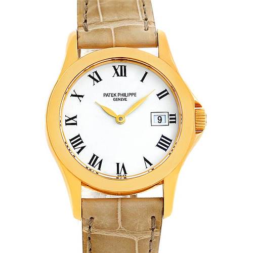 The image shows a front view of the Patek Philippe 4906J Women's Yellow Gold White Dial 4906J Women's Yellow Gold White Dial 4906J 18k Yellow Gold Ladies Watch with a beige leather strap.