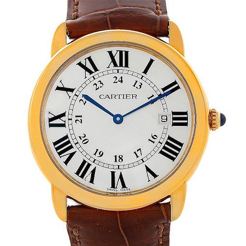 The image shows a front view of a Ronde model watch by Cartier with a gold casing, Roman numerals, and a brown leather strap.