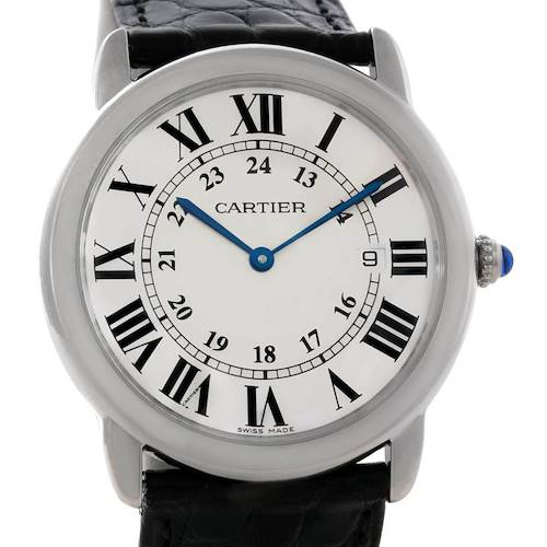 The image shows a close-up of the Cartier Ronde W6700255 Men's Stainless Steel Silver Dial W6700255 Men's Stainless Steel Silver Dial model watch, focusing on the face with Roman numerals and the crown with a blue gem.