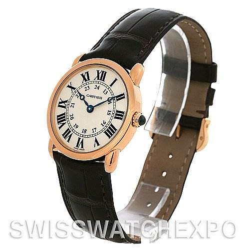 The image shows a side and front angle of the Cartier Ronde W6800151 Women's Rose Gold Silver Dial W6800151 Women's Rose Gold Silver Dial model, highlighting its round dial and black leather strap.