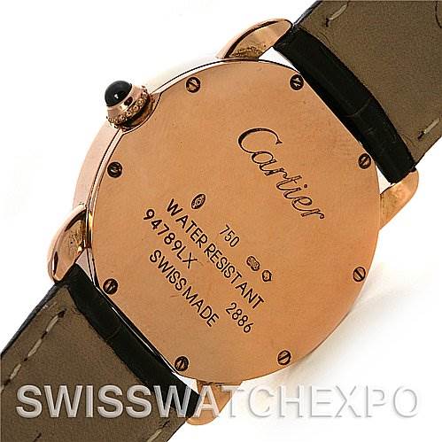 The image shows the back case of a Cartier Ronde W6800151 Women's Rose Gold Silver Dial W6800151 Women's Rose Gold Silver Dial watch, highlighting the inscriptions and leather straps.