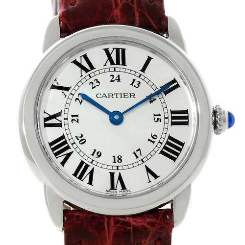 The image shows a front view of the Cartier Ronde W6700155 Women's Stainless Steel Silver Dial W6700155 Women's Stainless Steel Silver Dial model watch, highlighting its face, Roman numerals, and part of its red strap.