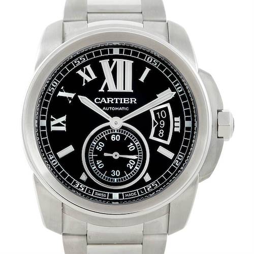 The image shows a front view of the Calibre de Cartier watch by Cartier, displaying its black dial, Roman numerals, and metal bracelet.