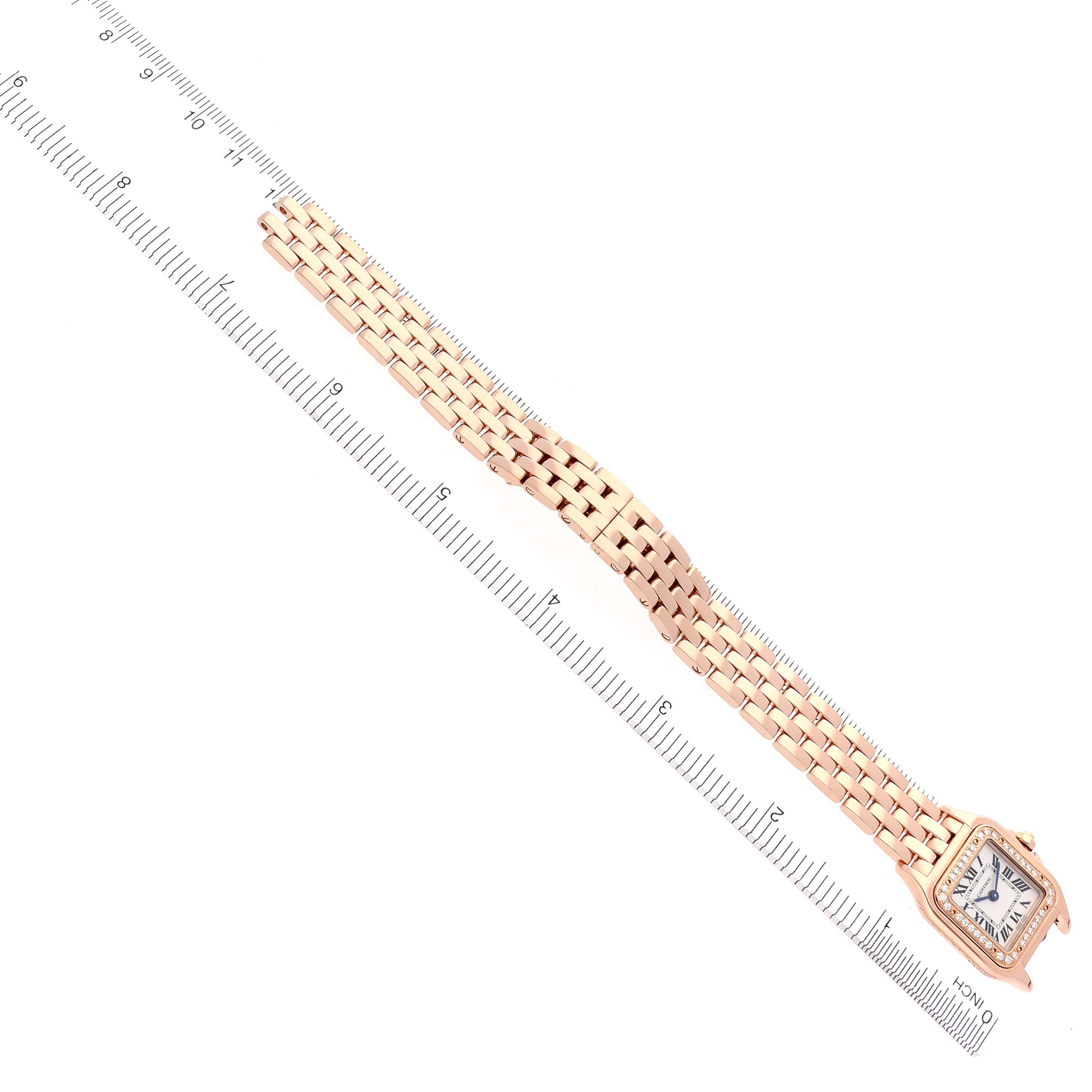 The Cartier Panthere WJPN0008 Women's Rose Gold Silver Dial WJPN0008 Women's Rose Gold Silver Dial watch is shown from an overhead angle, highlighting its face, case, and gold bracelet.
