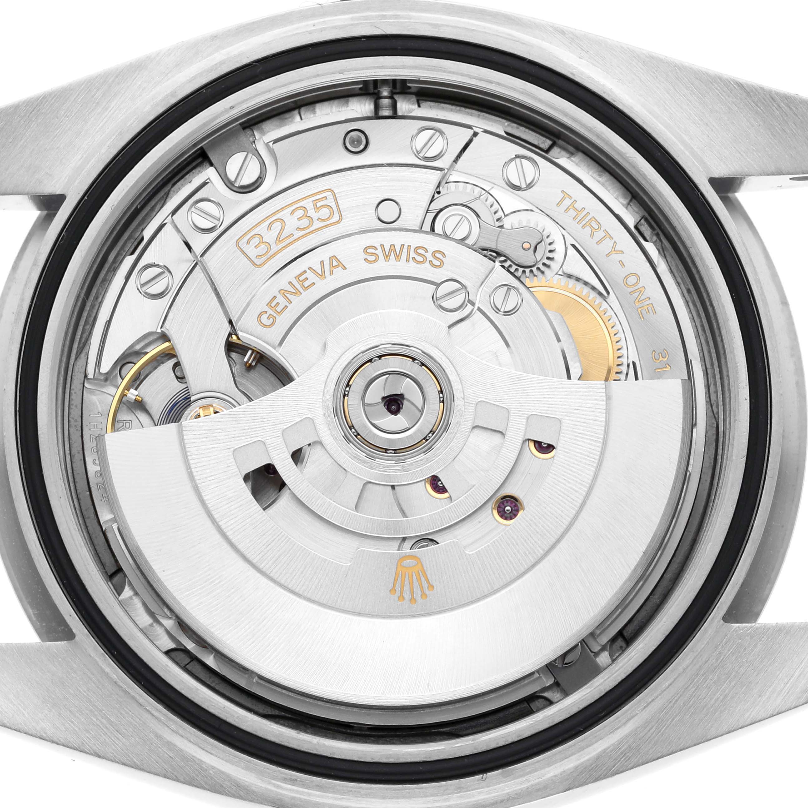 The image shows the back view of a Rolex Datejust 41 126334 Men's Stainless Steel Blue Dial 126334 Men's Stainless Steel Blue Dial, focusing on its movement and internal mechanisms.