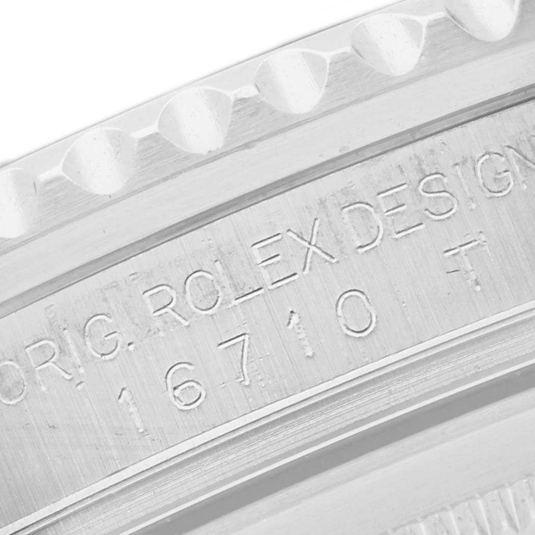 The image shows the side engraving of the bezel and case with model details on the Rolex GMT-Master 16710T Men's Stainless Steel Black Dial 16710T Men's Stainless Steel Black Dial.