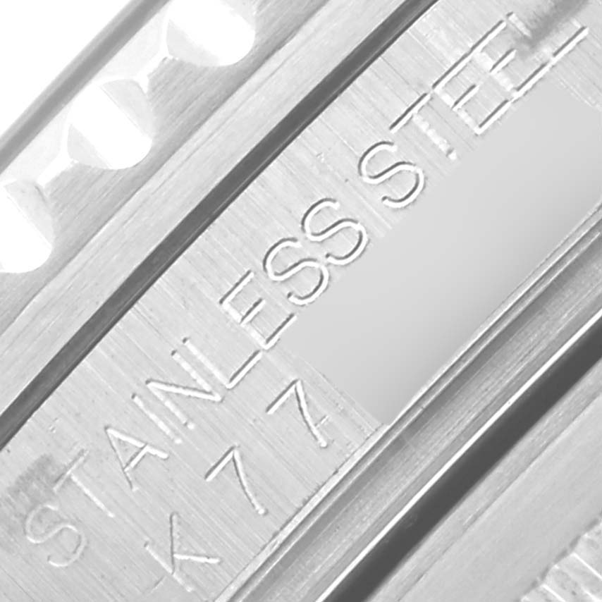 The image shows a close-up of the stainless steel bracelet with engravings on the Rolex GMT-Master 16710 Men's Stainless Steel Black Dial 16710 Men's Stainless Steel Black Dial watch.