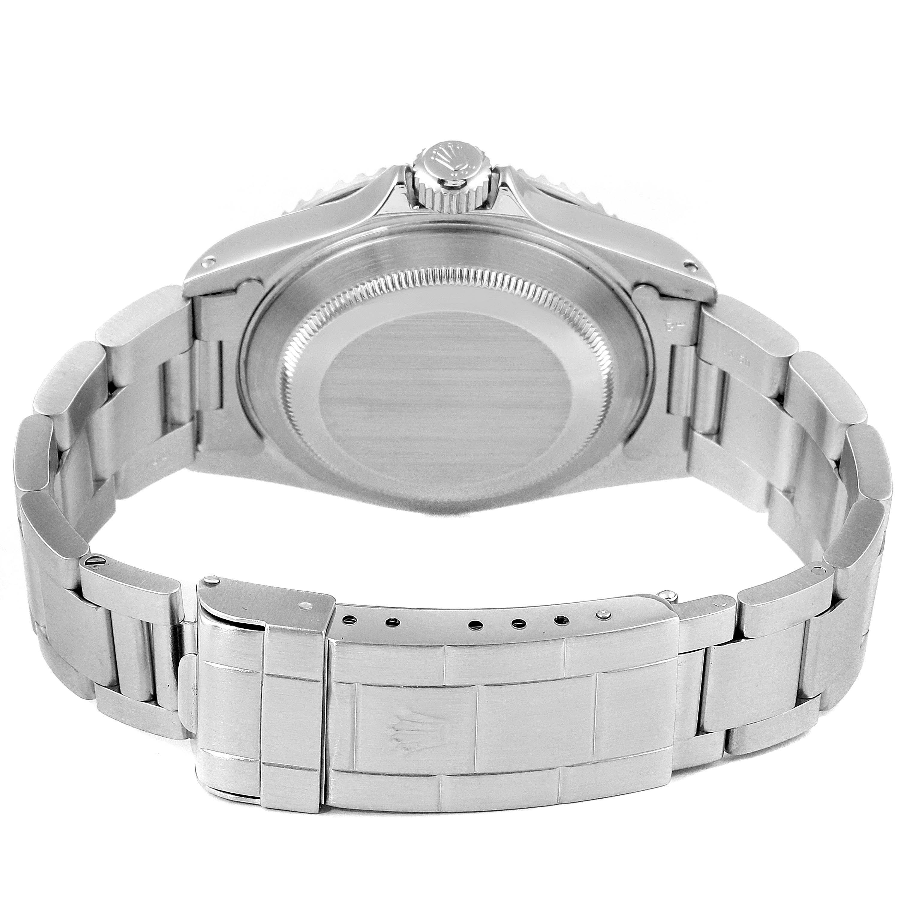 This image shows the backside, clasp, and bracelet of a Rolex Submariner 14060M Men's Stainless Steel Black Dial 14060M Men's Stainless Steel Black Dial watch in a slightly angled view from the back.